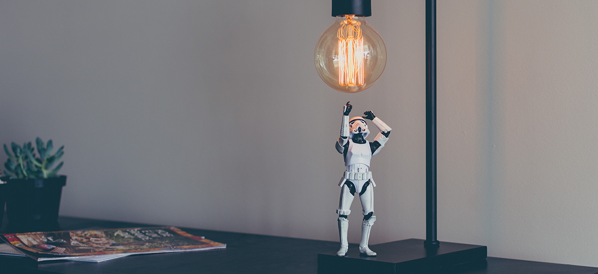 a stormtrooper reaching for a lamp